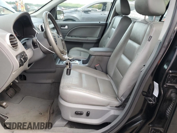 2006 Ford Freestyle SEL z VIN 1FMDK05106GA49966, wystawiony jako Copart lot #69358494 z przebiegiem 125 462 mil mil oraz Czysty tytuł • Clean title. Historia ofert i sprzedaży dostępna na DreamBid. Obrazek 7.