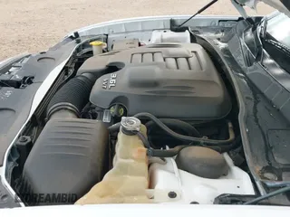 2014 Dodge Charger SE z VIN 2C3CDXBG9EH168134, wystawiony jako IAAI lot #42462158 z przebiegiem 129 034 mil mil oraz . Historia ofert i sprzedaży dostępna na DreamBid. Obrazek 19.