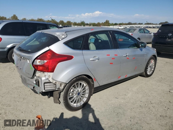 2014 Ford Focus Electric with VIN 1FADP3R45EL287285, listed as a Copart auction lot 74148154 with 64,543 mi miles and Salvage title. Bid and sale history available at DreamBid. Image 3.