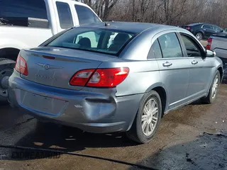 2008 Chrysler Sebring with VIN 1C3LC66J18N243827, listed as a IAAI auction lot 41642713 with 231,682 mi miles and . Bid and sale history available at DreamBid. Image 4.