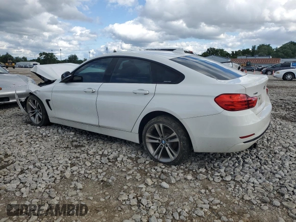 2015 BMW 4 Series 428i xDrive with VIN WBA4A7C53FD415066, listed as a Copart auction lot 61880545 with 130,874 mi miles and Salvage title. Bid and sale history available at DreamBid. Image 2.