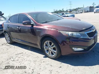 2012 Kia Optima EX with VIN 5XXGN4A73CG071036, listed as a IAAI auction lot 41849926 with 147,448 mi miles. Bid and sale history available at carsss.com. Image 1.