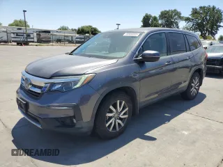 2019 Honda Pilot EX-L with VIN 5FNYF5H57KB031930, listed as a Copart auction lot 60906885 with 112,083 mi miles and Salvage title. Bid and sale history available at DreamBid. Image 1.