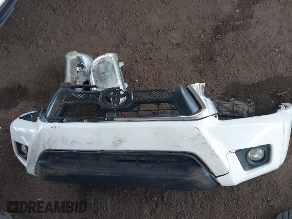 2015 Toyota Tacoma with VIN 3TMMU4FN0FM084956, listed as a IAAI auction lot 42184249 with 116,576 mi miles and . Bid and sale history available at DreamBid. Image 12.