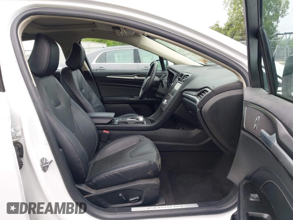 2020 Ford Fusion Titanium with VIN 3FA6P0RUXLR139574, listed as a IAAI auction lot 42299070 with 92,751 mi miles and . Bid and sale history available at DreamBid. Image 5.