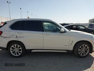 2014 BMW X5 sDrive35i with VIN 5UXKR2C53E0C01692, listed as a IAAI auction lot 41727216 with 135,985 mi miles. Bid and sale history available at carsss.com. Image 13.