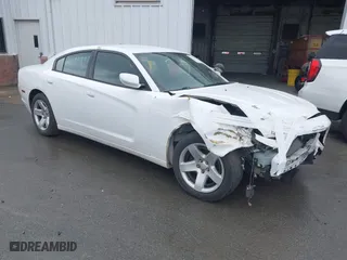 2014 Dodge Charger Police with VIN 2C3CDXAGXEH121289, listed as a IAAI auction lot 41511009 with 153,605 mi miles. Bid and sale history available at carsss.com. Image 1.