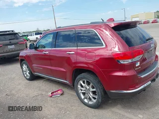 2014 Jeep Grand Cherokee Summit z VIN 1C4RJFJT4EC423217, wystawiony jako IAAI lot #42704059 z przebiegiem 245 928 mil mil oraz . Historia ofert i sprzedaży dostępna na DreamBid. Obrazek 14.