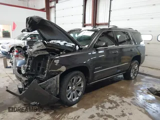 2016 GMC Yukon Denali with VIN 1GKS2CKJ8GR215954, listed as a IAAI auction lot 41362739 with 143,982 mi miles. Bid and sale history available at carsss.com. Image 2.