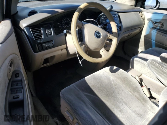 2002 Mazda MPV LX with VIN JM3LW28J020309014, listed as a Copart auction lot 81004584 with 249,161 mi miles and Salvage title. Bid and sale history available at DreamBid. Image 8.
