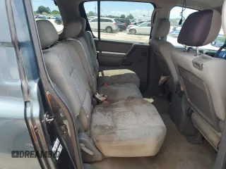 2005 Nissan Armada LE z VIN 5N1AA08A95N738884, wystawiony jako Copart lot #56823015 z przebiegiem 183 395 mil mil oraz Czysty tytuł • Clean title. Historia ofert i sprzedaży dostępna na DreamBid. Obrazek 11.