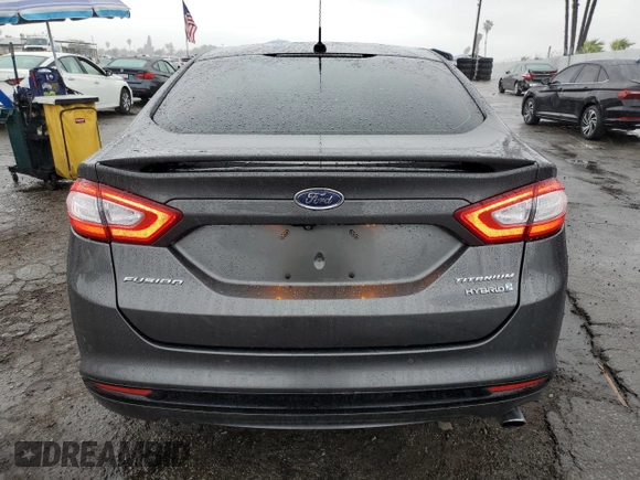 2016 Ford Fusion Titanium Hybrid z VIN 3FA6P0RU5GR356987, wystawiony jako Copart lot #48211775 z przebiegiem 145 192 mil mil oraz Szkoda całkowita • Salvage title. Historia ofert i sprzedaży dostępna na DreamBid. Obrazek 6.