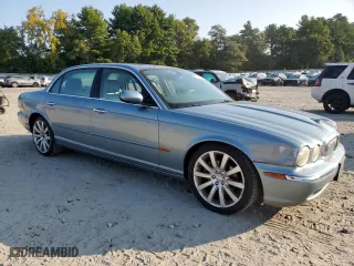 2005 Jaguar XJ with VIN SAJWA79C75SG46486, listed as a Copart auction lot 71781854 with 72,927 mi miles and Salvage Title. Bid and sale history available at carsss.com. Image 4.