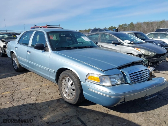 2005 Ford Crown Victoria LX with VIN 2FAFP74W65X135964, listed as a IAAI auction lot 41271175 with 82,494 mi miles. Bid and sale history available at carsss.com. Image 13.