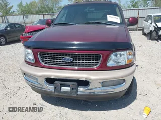 1998 Ford Expedition XLT z VIN 1FMRU17L9WLC23691, wystawiony jako IAAI lot #42107464 z przebiegiem 311 300 mil mil oraz . Historia ofert i sprzedaży dostępna na DreamBid. Obrazek 6.