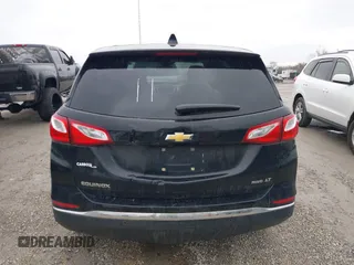 2019 Chevrolet Equinox LT z VIN 2GNAXTEV6K6132123, wystawiony jako IAAI lot #41565324 z przebiegiem 253 190 mil mil oraz . Historia ofert i sprzedaży dostępna na DreamBid. Obrazek 17.