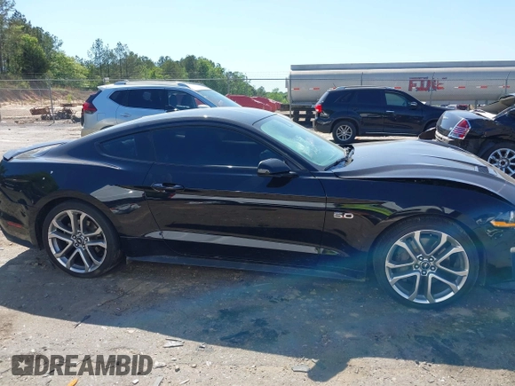 2021 Ford Mustang GT z VIN 1FA6P8CFXM5156002, wystawiony jako IAAI lot #42009222 z przebiegiem 65 939 mil mil oraz . Historia ofert i sprzedaży dostępna na DreamBid. Obrazek 13.