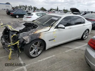 2014 BMW 7 Series 740Li with VIN WBAYE4C52ED137845, listed as a Copart auction lot 50942235 with Not provided miles and Salvage title. Bid and sale history available at DreamBid. Image 1.