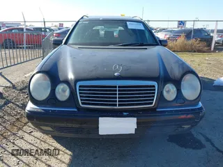 1999 Mercedes-Benz E-Class with VIN WDBJH82F2XX027360, listed as a IAAI auction lot 40977518 with 1 mi miles. Bid and sale history available at carsss.com. Image 6.