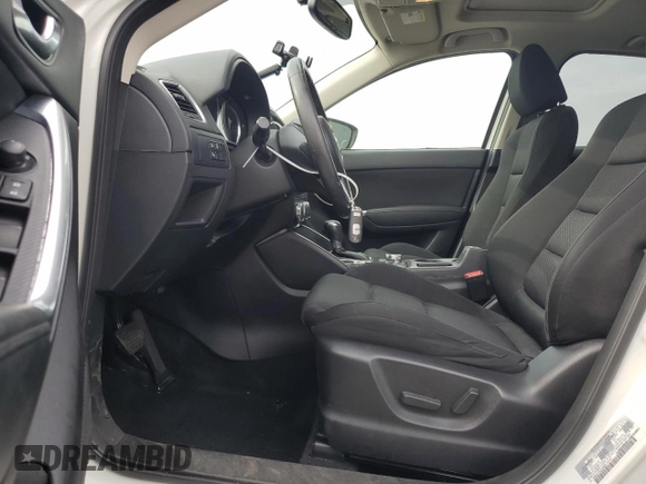 2016 Mazda CX-5 Touring with VIN JM3KE2CY5G0838663, listed as a Copart auction lot 47658065 with 51,470 mi miles and Salvage Title. Bid and sale history available at carsss.com. Image 7.