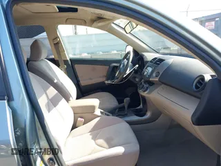 2006 Toyota RAV4 with VIN JTMZD33V465012121, listed as a IAAI auction lot 42013354 with 214,726 mi miles. Bid and sale history available at carsss.com. Image 5.