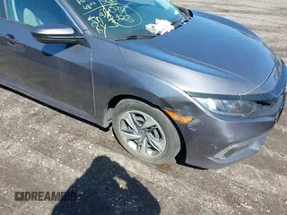 2019 Honda Civic LX with VIN 2HGFC2F66KH547041, listed as a IAAI auction lot 41984140 with 90,123 mi miles and . Bid and sale history available at DreamBid. Image 6.