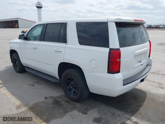 2020 Chevrolet Tahoe Commercial with VIN 1GNSKDEC9LR260983, listed as a IAAI auction lot 42062097 with 124,911 mi miles. Bid and sale history available at carsss.com. Image 3.