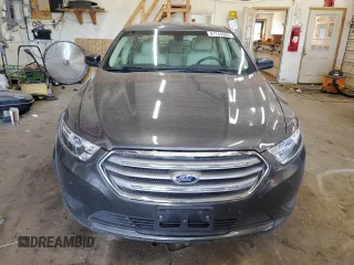 2015 Ford Taurus SEL with VIN 1FAHP2E84FG102318, listed as a Copart auction lot 61744685 with 82,149 mi miles and Salvage title. Bid and sale history available at DreamBid. Image 5.