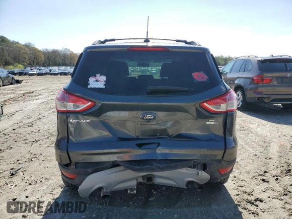 2016 Ford Escape SE with VIN 1FMCU9G95GUB90533, listed as a Copart auction lot 51697205 with 68,767 mi miles and Salvage Title. Bid and sale history available at carsss.com. Image 6.