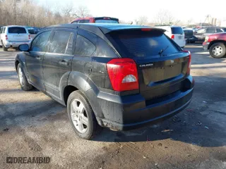 2007 Dodge Caliber SXT with VIN 1B3HB48BX7D126977, listed as a IAAI auction lot 41671535 with 190,844 mi miles. Bid and sale history available at carsss.com. Image 3.