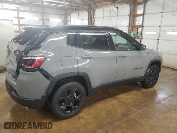 2023 Jeep Compass Trailhawk z VIN 3C4NJDDN9PT557910, wystawiony jako Copart lot #59387825 z przebiegiem 39 686 mil mil oraz Czysty tytuł • Clean title. Historia ofert i sprzedaży dostępna na DreamBid. Obrazek 3.