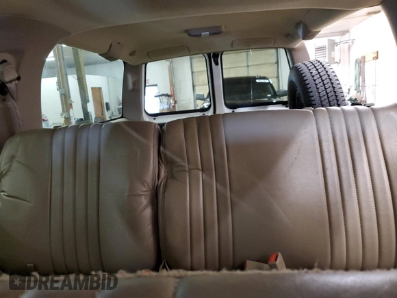 1999 Chevrolet Suburban with VIN 1GNGK26R5XJ474631, listed as a Copart auction lot 79280564 with 97,119 mi miles and Salvage Title. Bid and sale history available at carsss.com. Image 10.