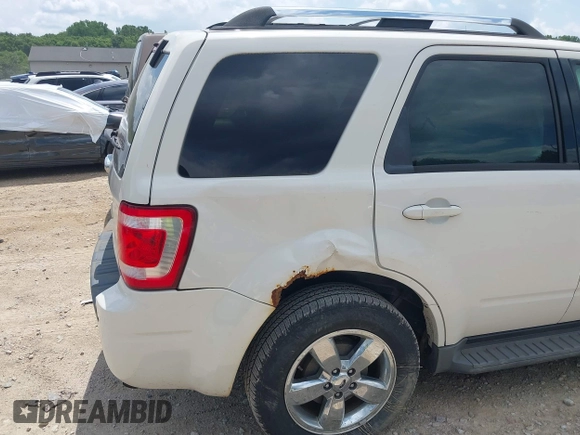 2011 Ford Escape Limited with VIN 1FMCU0E7XBKC61792, listed as a IAAI auction lot 42669924 with 164,765 mi miles and . Bid and sale history available at DreamBid. Image 6.