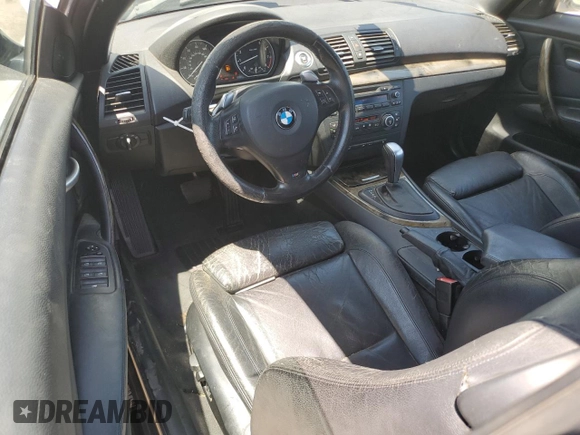 2009 BMW 1 Series 135i with VIN WBAUN93599VK40210, listed as a Copart auction lot 54166905 with 148,899 mi miles and Salvage title. Bid and sale history available at DreamBid. Image 8.