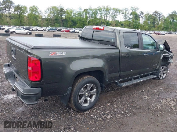 2018 Chevrolet Colorado 4WD Z71 with VIN 1GCGTDEN3J1184203, listed as a IAAI auction lot 42250291 with 72,972 mi miles and . Bid and sale history available at DreamBid. Image 4.