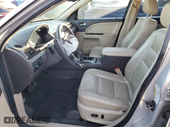 2009 Ford Taurus Limited with VIN 1FAHP25W89G101188, listed as a Copart auction lot 77220984 with 149,142 mi miles and Salvage Title. Bid and sale history available at carsss.com. Image 7.