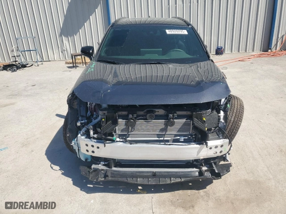 2025 Toyota RAV4 Prime XSE with VIN JTMEB3FV7SD235723, listed as a Copart auction lot 48920295 with 1,082 mi miles and Salvage Title. Bid and sale history available at carsss.com. Image 5.