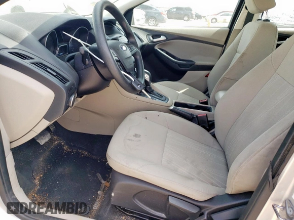 2015 Ford Focus SE z VIN 1FADP3F22FL343834, wystawiony jako Copart lot #58076265 z przebiegiem 101 891 mil mil oraz Szkoda całkowita • Salvage title. Historia ofert i sprzedaży dostępna na DreamBid. Obrazek 7.