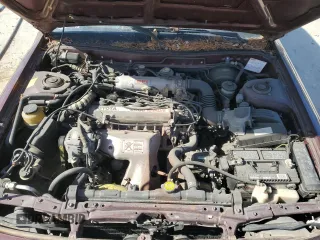 1989 Toyota Camry DLX z VIN 4T1SV21E3KU053153, wystawiony jako Copart lot #49917485 z przebiegiem 79 028 mil mil oraz Szkoda całkowita • Salvage title. Historia ofert i sprzedaży dostępna na DreamBid. Obrazek 11.