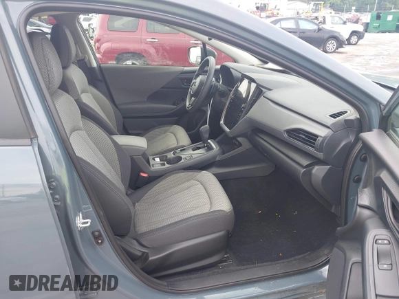 2024 Subaru Crosstrek Premium z VIN JF2GUADC7R8299418, wystawiony jako IAAI lot #42358005 z przebiegiem 21 690 mil mil oraz . Historia ofert i sprzedaży dostępna na DreamBid. Obrazek 5.