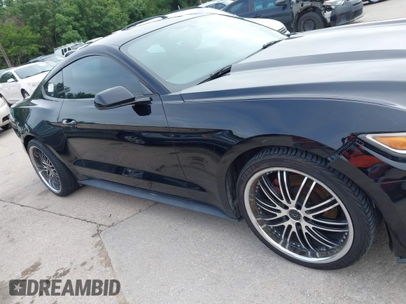 2016 Ford Mustang V6 z VIN 1FA6P8AM3G5256187, wystawiony jako IAAI lot #42415645 z przebiegiem 141 235 mil mil oraz . Historia ofert i sprzedaży dostępna na DreamBid. Obrazek 13.