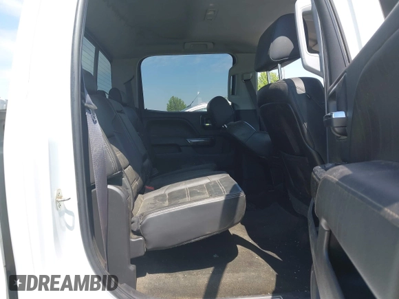 2015 GMC Sierra 2500HD Denali z VIN 1GT120E8XFF121170, wystawiony jako IAAI lot #42051421 z przebiegiem Nie podano mil oraz . Historia ofert i sprzedaży dostępna na DreamBid. Obrazek 8.