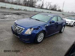 2013 Cadillac CTS Luxury with VIN 1G6DE5E54D0105721, listed as a Copart auction lot 37633874 with 71,341 mi miles and Salvage title. Bid and sale history available at DreamBid. Image 1.