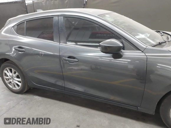 2015 Mazda 3 i Touring with VIN JM1BM1L75F1259985, listed as a IAAI auction lot 41067447 with 104,865 mi miles and . Bid and sale history available at carsss.com. Image 13.