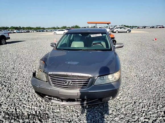 2007 Hyundai Azera SE z VIN KMHFC46F87A164195, wystawiony jako Copart lot #52500115 z przebiegiem 191 835 mil mil oraz Szkoda całkowita • Salvage title. Historia ofert i sprzedaży dostępna na DreamBid. Obrazek 10.