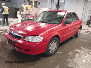 2000 Mazda Protege DX with VIN JM1BJ2220Y0258658, listed as a IAAI auction lot 41622579 with 276,682 mi miles and . Bid and sale history available at DreamBid. Image 18.