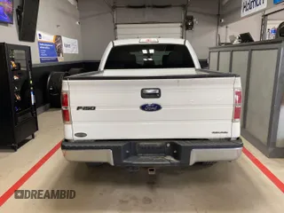 2014 Ford F-150 XL with VIN 1FTFW1EF9EFB59177, listed as a IAAI auction lot 42245944 with 184,239 mi miles and . Bid and sale history available at carsss.com. Image 17.