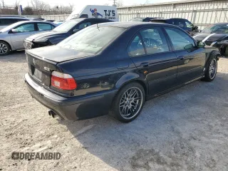 2003 BMW M5 z VIN WBSDE93413CF92478, wystawiony jako Copart lot #43822095 z przebiegiem 131 854 mil mil oraz Szkody całkowita. Historia ofert i sprzedaży dostępna na DreamBid. Obrazek 3.