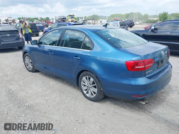 2015 Volkswagen Jetta SE with VIN 3VWD17AJ6FM231597, listed as a IAAI auction lot 42718275 with Not provided miles and . Bid and sale history available at DreamBid. Image 3.