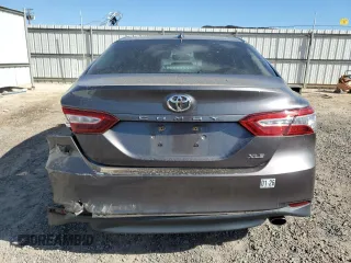 2019 Toyota Camry LE z VIN 4T1B11HKXKU209352, wystawiony jako Copart lot #52219645 z przebiegiem 23 136 mil mil oraz Szkoda całkowita • Salvage title. Historia ofert i sprzedaży dostępna na DreamBid. Obrazek 6.